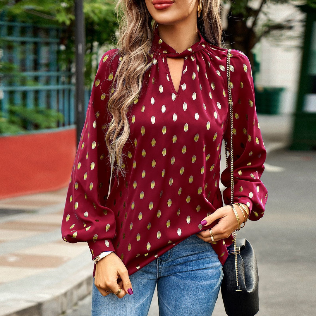 Dame elegant bluse med gyldne prikker og moderne puffærmer Stilla