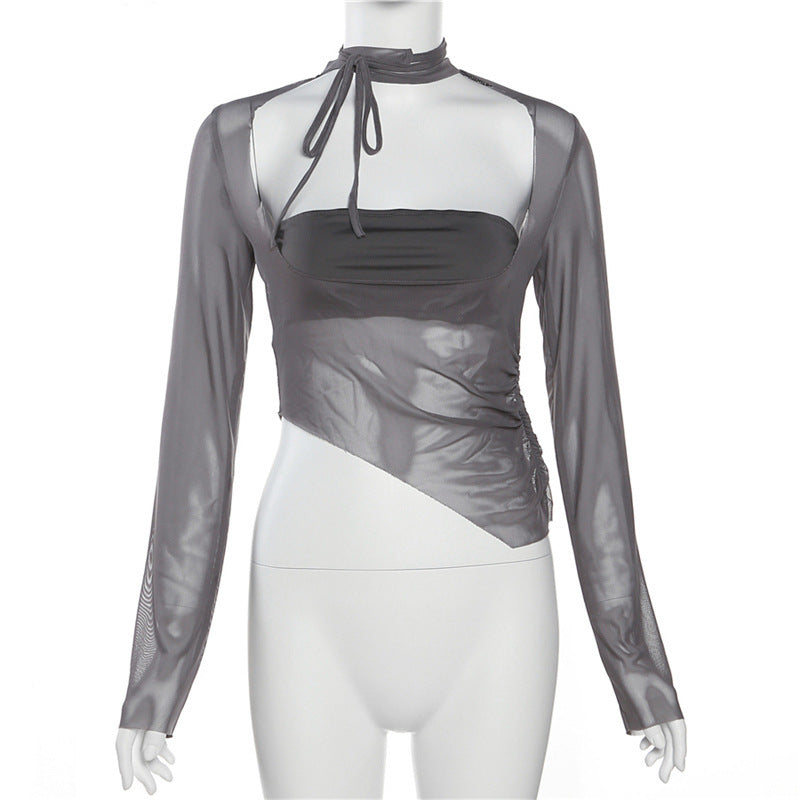 Dame langærmet top med asymmetrisk snit og transparente detaljer Stilla