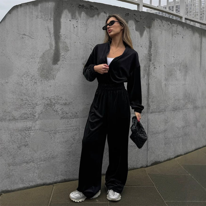 Kvinders fleece jumpsuit med stilfulde lynlåsdetailler og elastisk talje Skovae