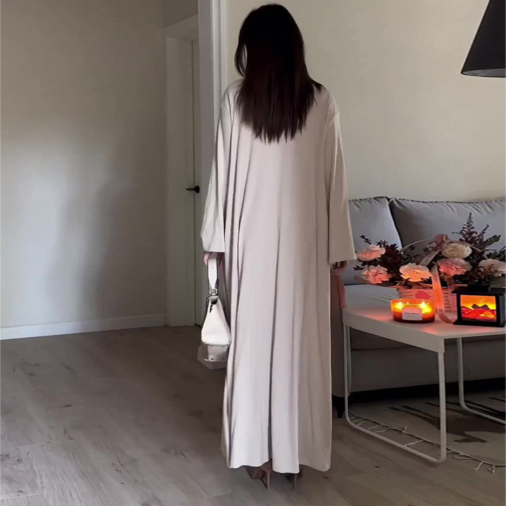 Dame elegant maxikjole med høj krave og bredt skårne ærmer Stilla