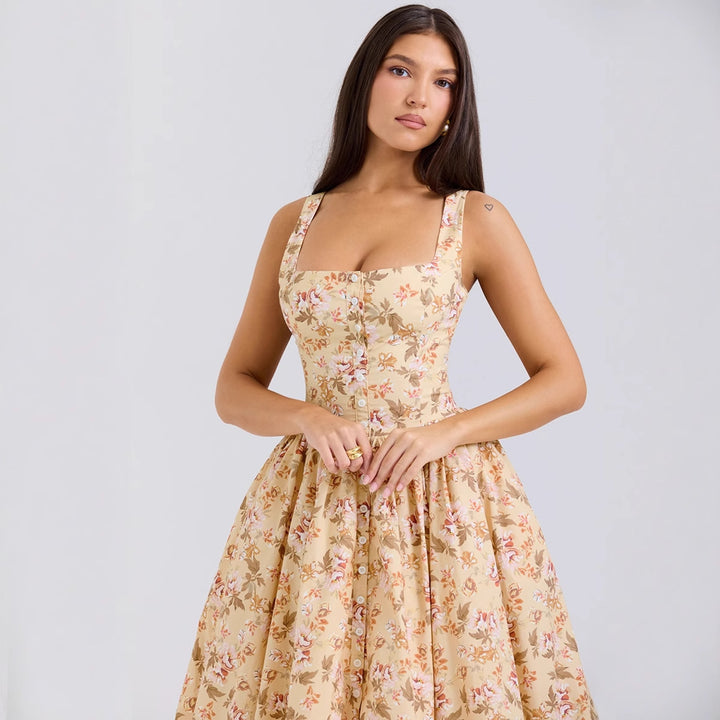 Dame Midikjole i vintage-stil med blomstertryk og svajende skørt Stilla