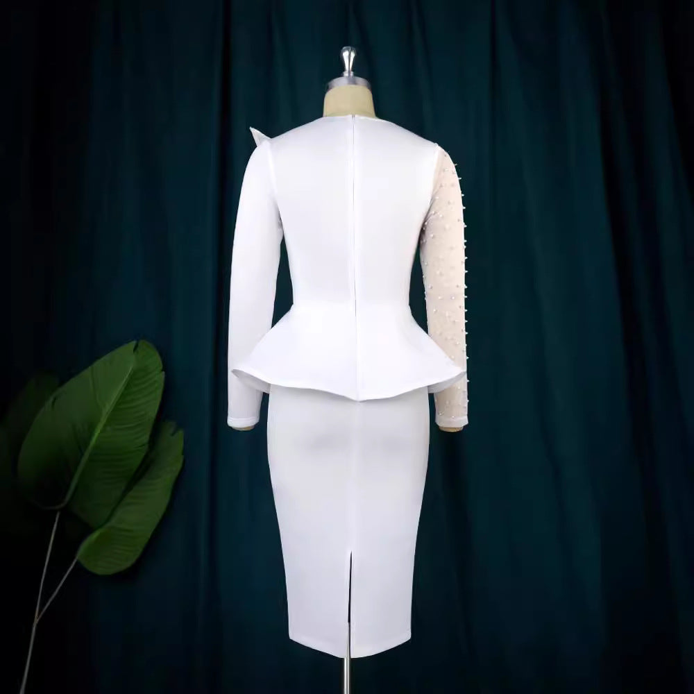 Dame Etuikjole med transparente puffærmer og dekorativt peplum Skovae
