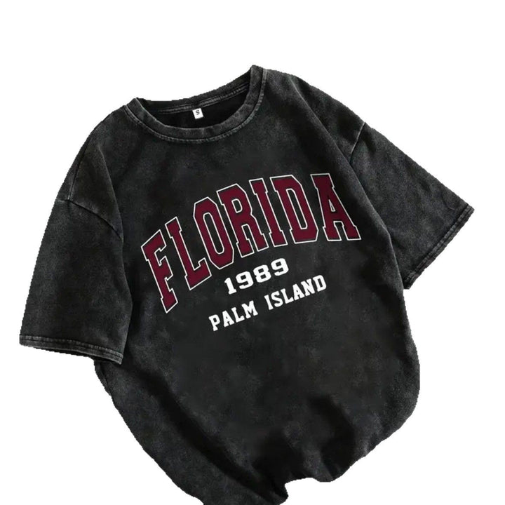 Dame T-shirt med kreativ Florida-print og komfortabel oversized-snit Stilla