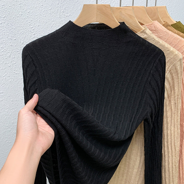 Dame Rullekrave sweater med fin ribstruktur og figurformende snit Stilla