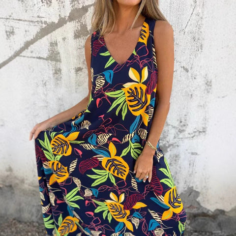 Dame maxikjole med blomster motiver og dyb V-udskæring Stilla