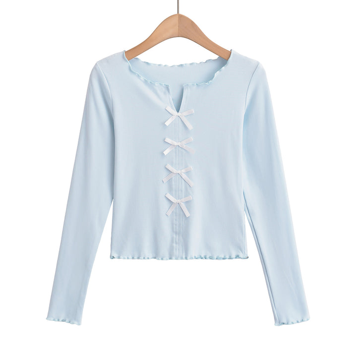 Dame elegant top med floral skæring og fine sløjfedetaljer Stilla
