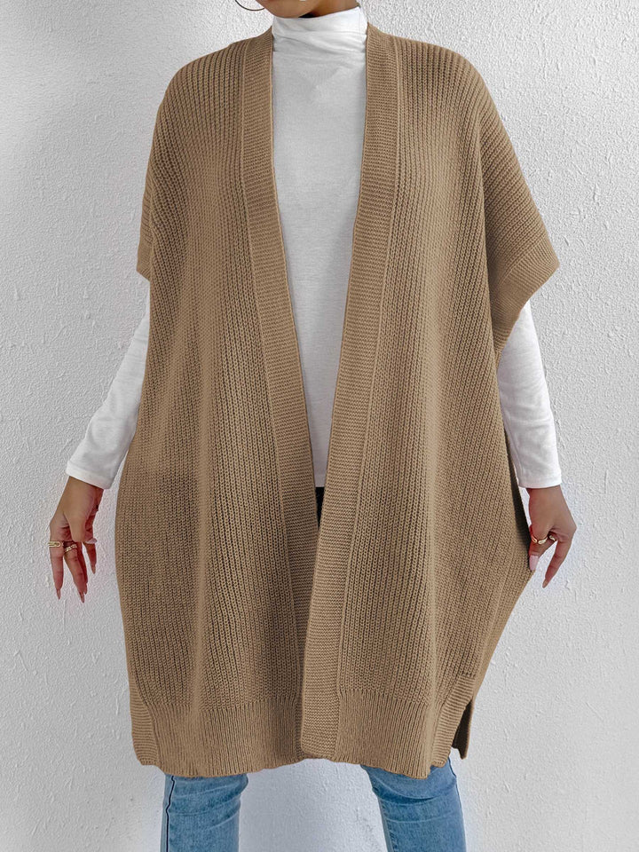 Dame strikjakke i afslappet oversized stil med åben front og sideslids Stilla
