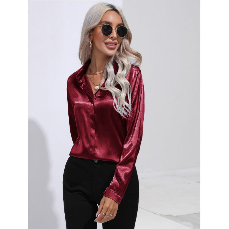 Dame satinbluse med elegant kentkrave og lange ærmer Stilla