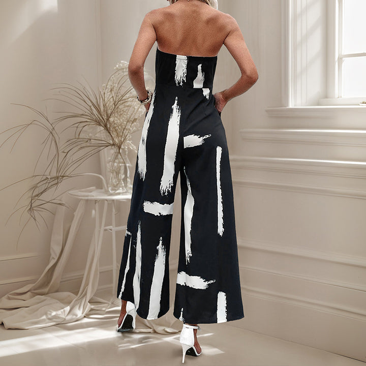 Dame stropløs jumpsuit med bred ben og figursyet bælte Stilla