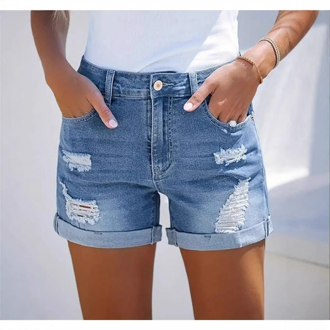 Damernes Ripped Denim-Shorts med moderne design og frynset kant Stilla