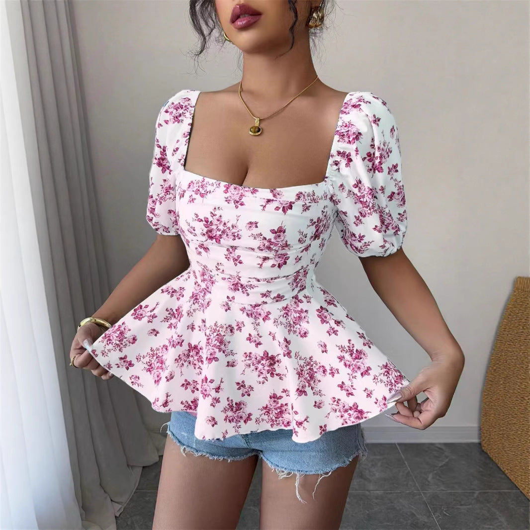 Damebluse med volang og blomsterdesign Stilla