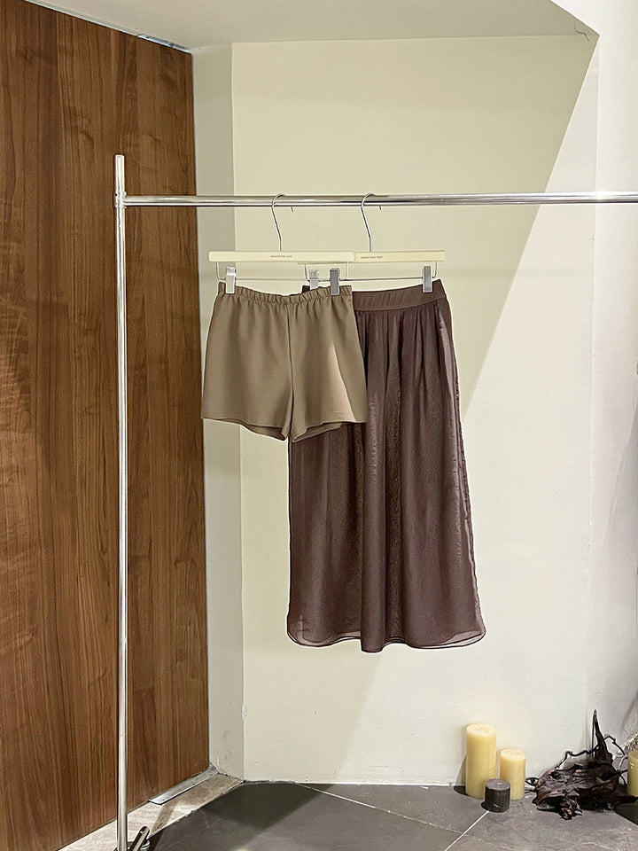 Dame alsidigt shorts- og nederdelssæt lavet af flydende stof med elastisk talje Stilla