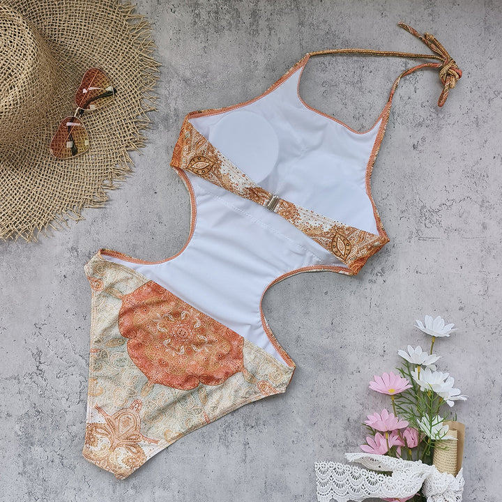 Dame badedragt med blomster cut-out design og elegant trusse Stilla