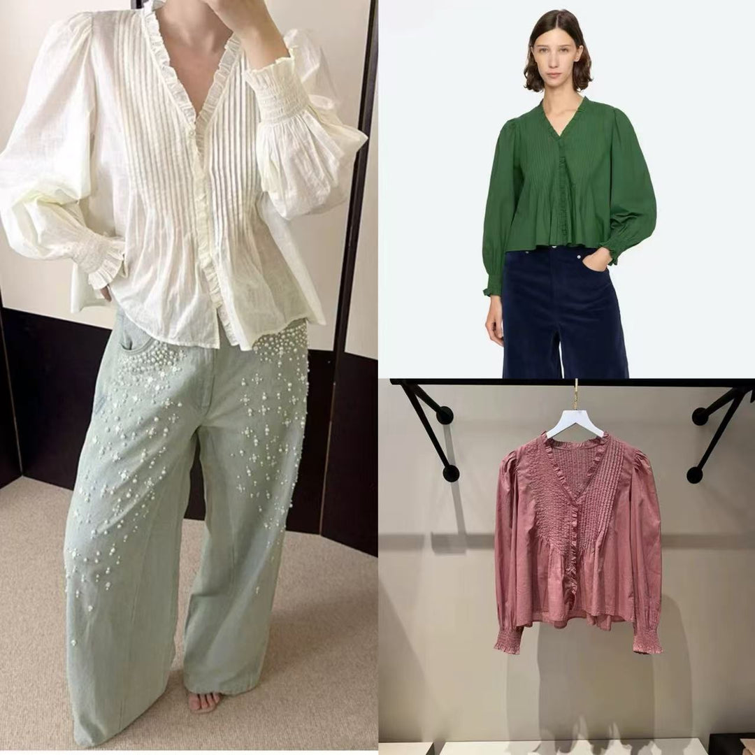 Damebluse med voluminøse ærmer og fine flæsedetaljer Stilla