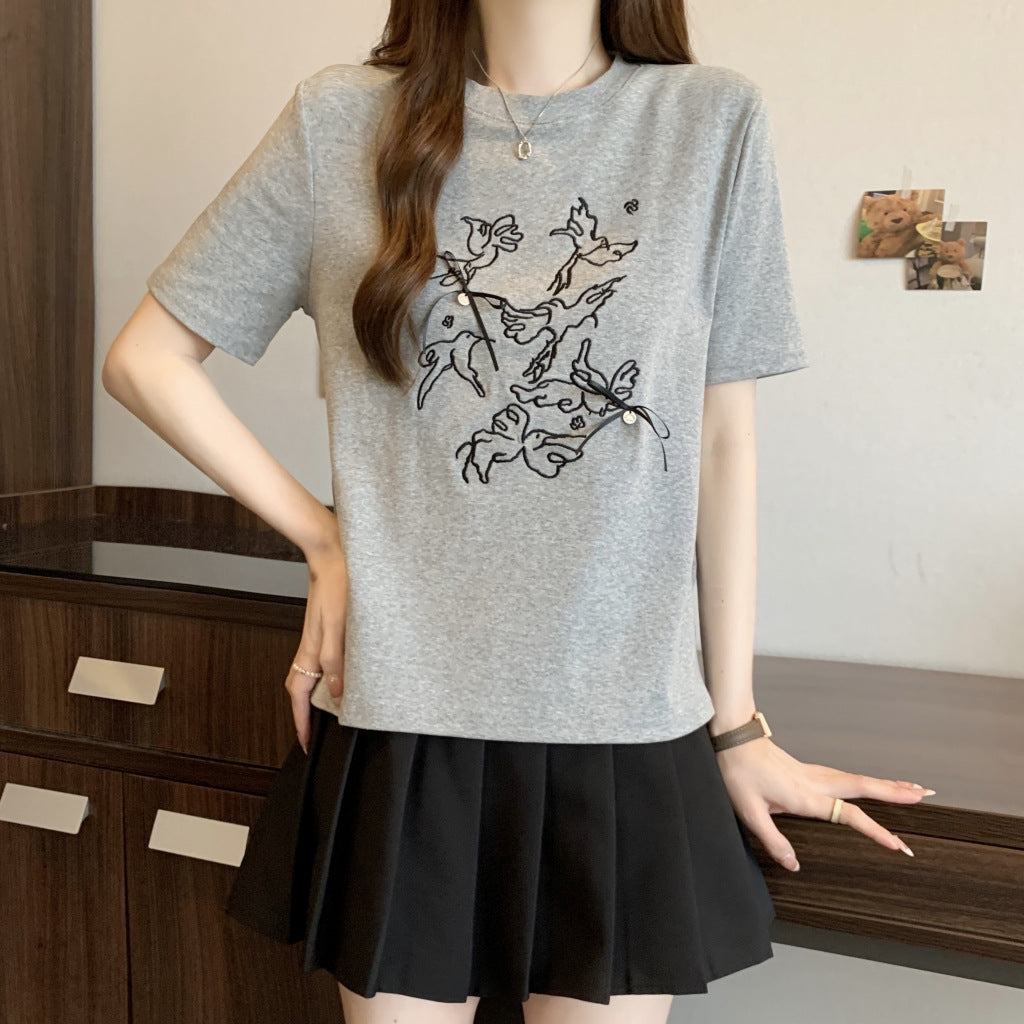 Femme Kunstnerisk Grafik T-shirt med Legesyg Design Stilla
