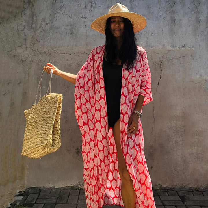 Dame strandkimono med luftigt snit og festligt bladdesign Stilla