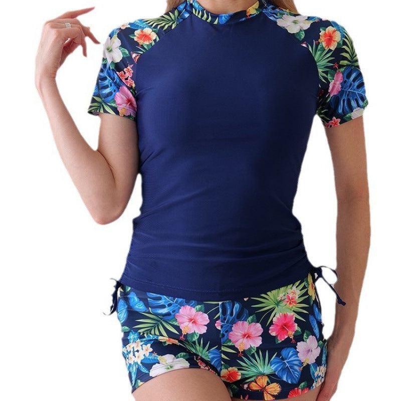 Dame Surf-dragt med blomsterdesign og mode accenter Skovae