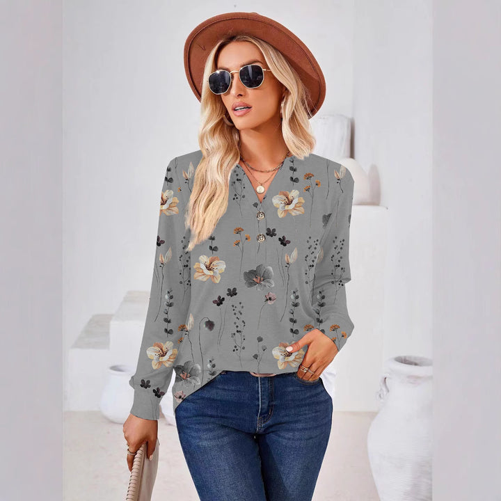 Damebluse med blomster mønster og knap detaljer Stilla