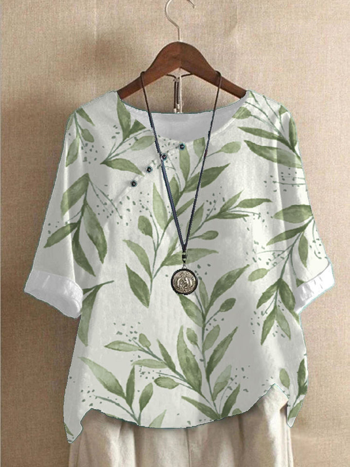 Damer bomuldsbluse med blomstertryk og elegant knaplukning Stilla
