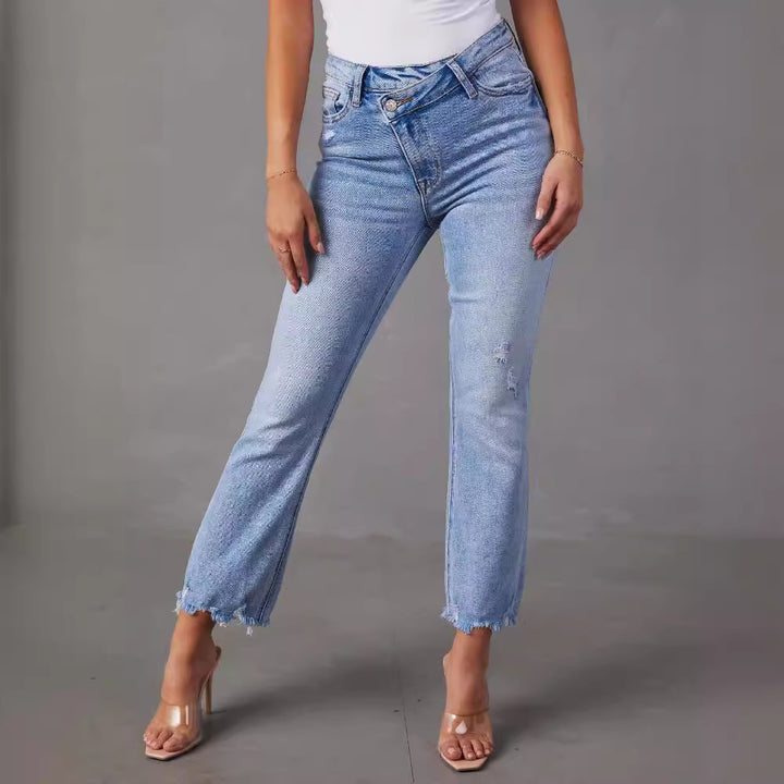 Damejeans med høj talje med trendy frynser og slidte detaljer Skovae