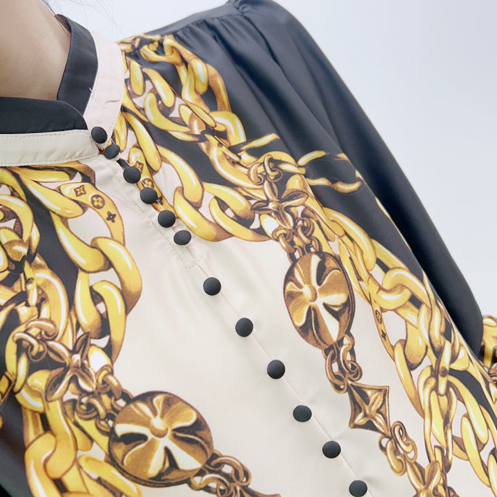 Dame chiffon-bluse med kunstnerisk kædemønster og elegante flæsedetaljer Stilla