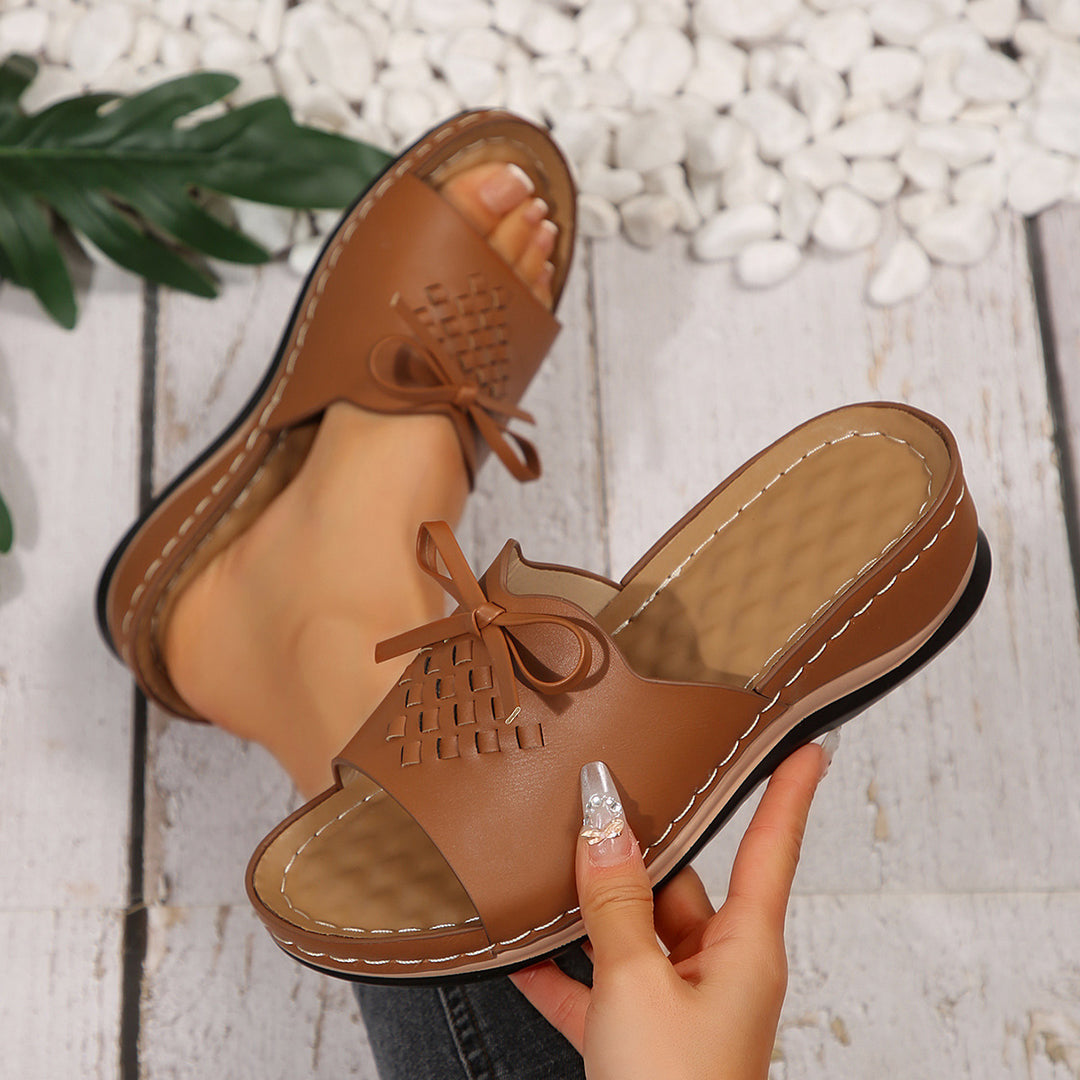 Dame Slide-sandaler med flettet overdel og dekorativt sløjfeaccent Stilla