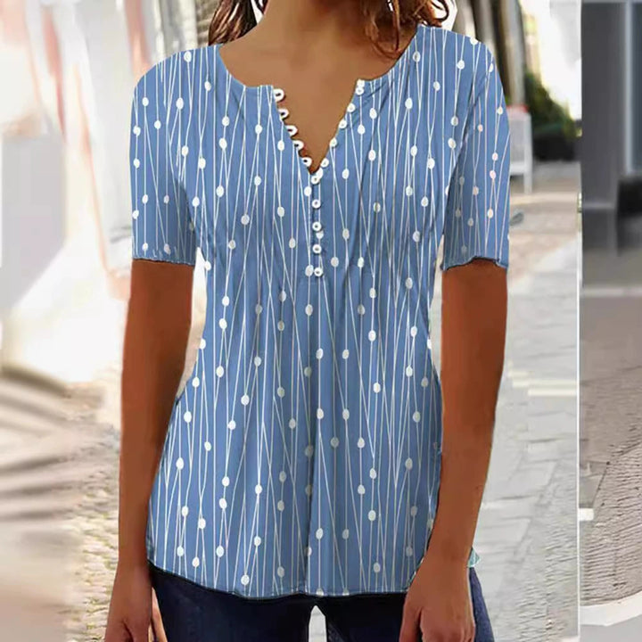 Dame bluse skjorte med moderigtigt prikkedesign og elegant knapliste Stilla