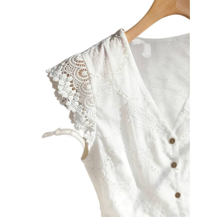 Damebluse med spidse ærmer og knapdetaljer Skovae