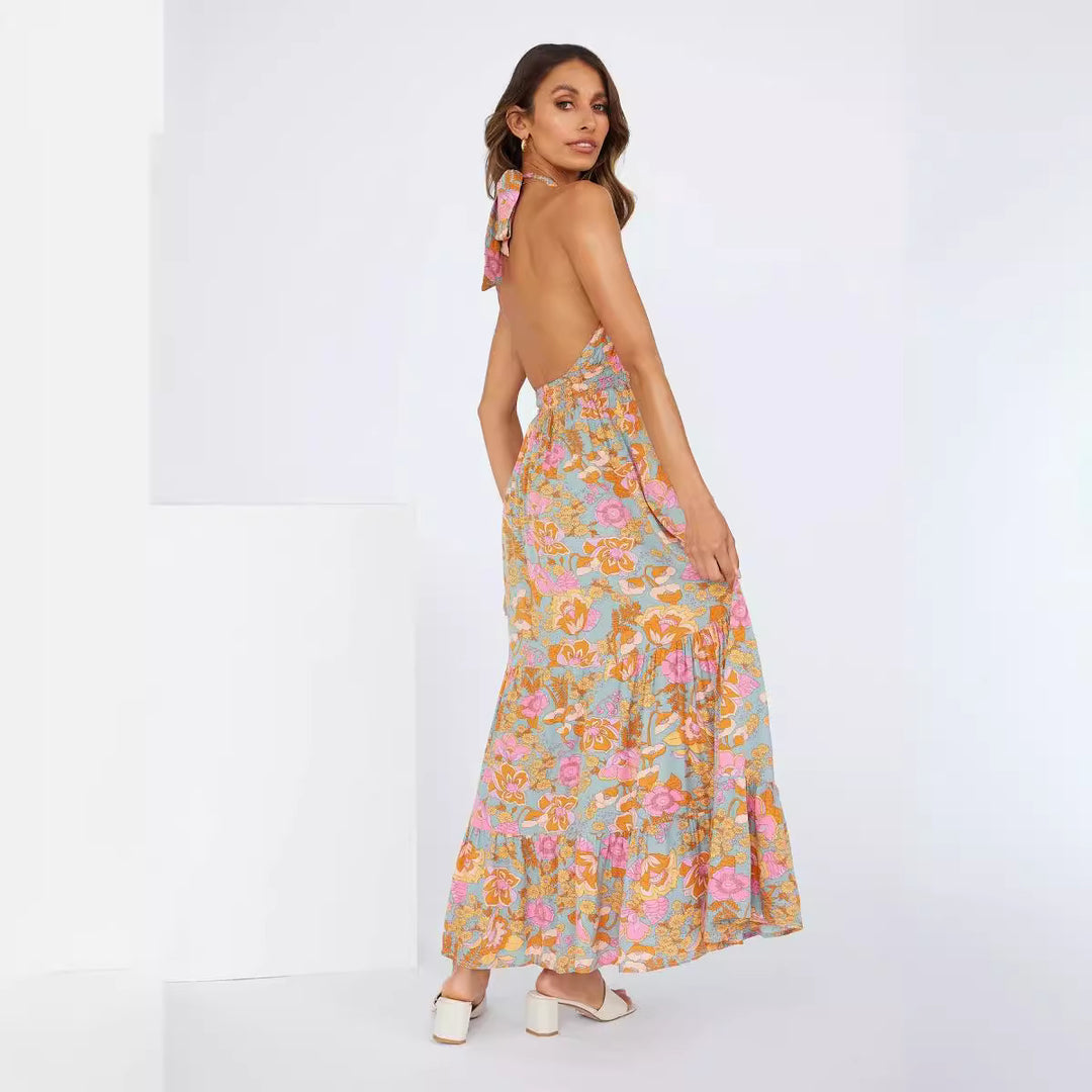 Dame maxikjole med legende halterdesign og blomsterprint Stilla