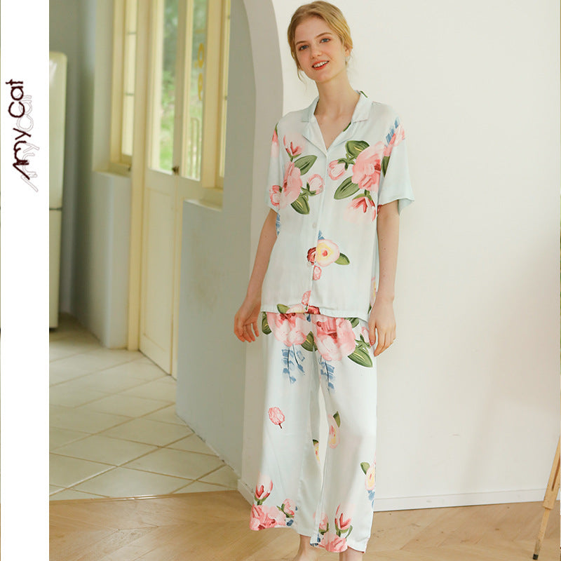 Dame elegant pyjamasæt med blomstret design og knapbar top Stilla