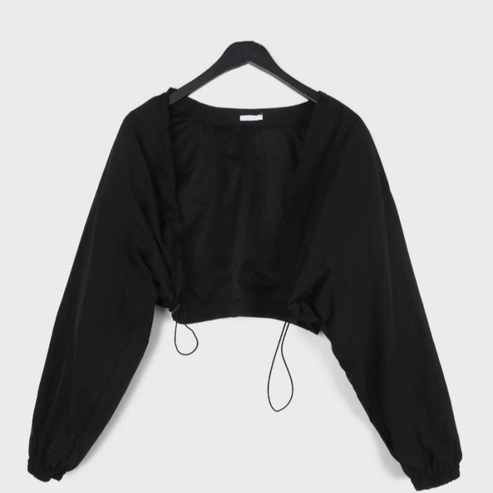 Kvindernes cropped langærmet bluse med flæser Stilla