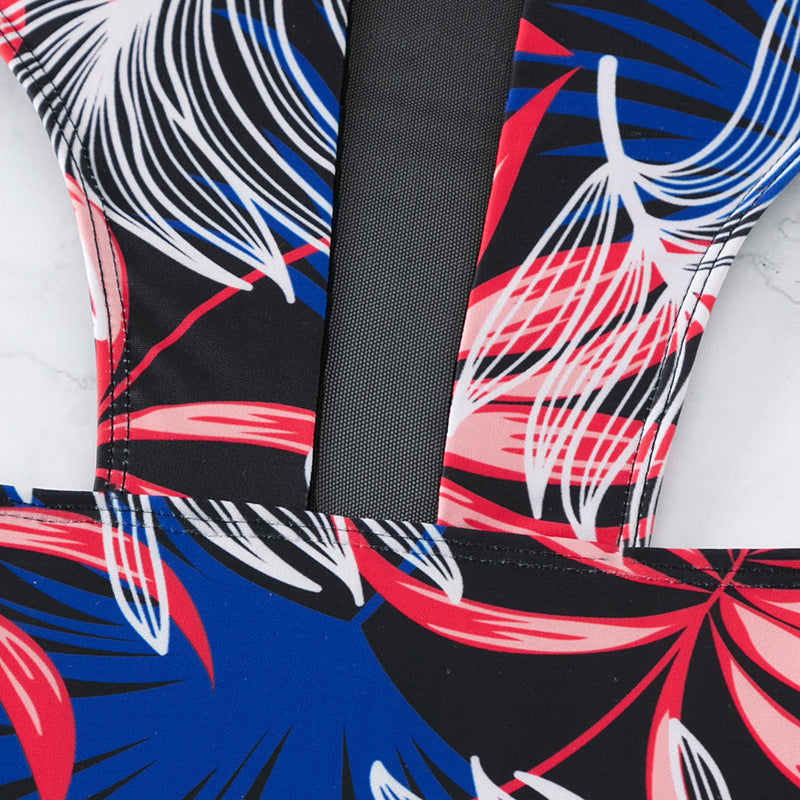 Dame ét-stykke badedragt med kreativt cut-out-design og sporty rygudskæring Stilla