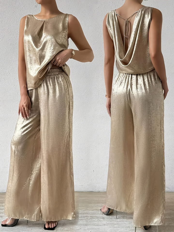 Dame jumpsuit med dyb rygudskæring og flydende silhuet Stilla