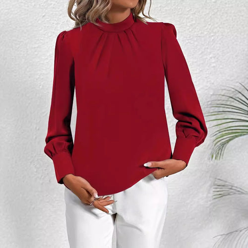 Damebluse med høj krave og elegante puffærmer Stilla