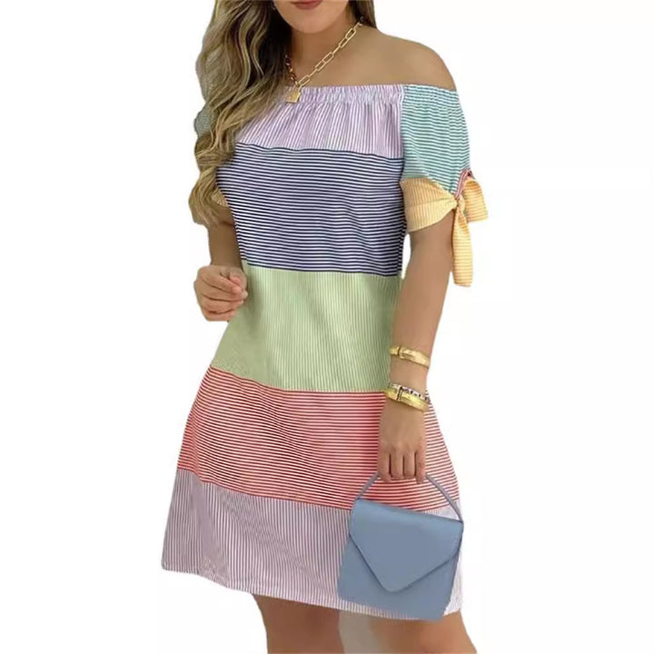 Dame Off-Shoulder Kjole med florale accenter og legende ærmer Stilla