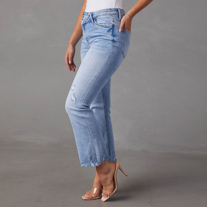 Dame Bootcut Jeans med frynset kanter og modepræget karakter Stilla