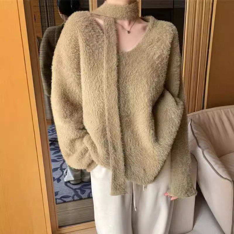 Dame grovstriktr sweater med dyb V-hals og flotte bånd detaljer Stilla