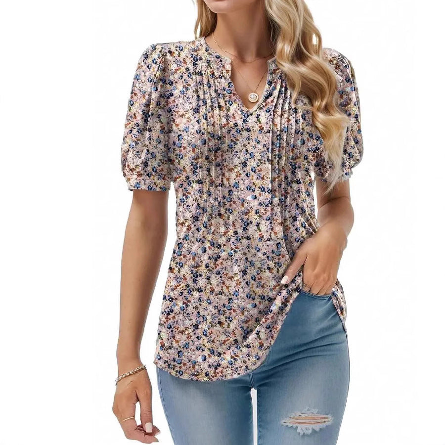 Damebluse med flæseærmer og blomsterdesign Stilla