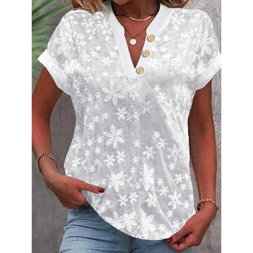 Damebluse med blomsterbroderi-design Stilla