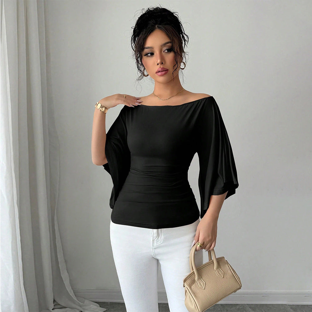 Kvinders elegante off-shoulder top med brede ærmer og tætsiddende pasform Stilla