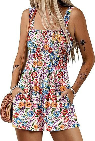 Dame jumpsuit med blomster mønster og praktiske lommer Stilla