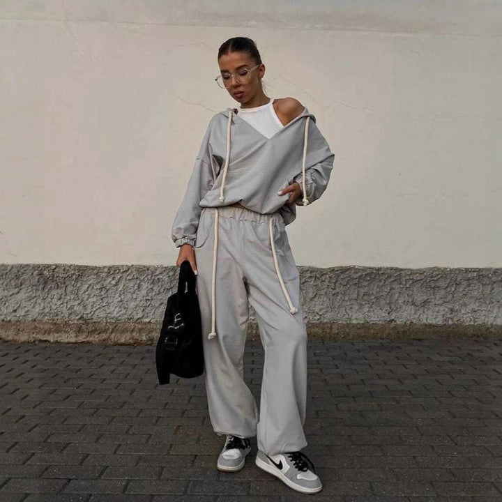 Kvinders casual jumpsuit med dyb V-hals og praktiske lommer