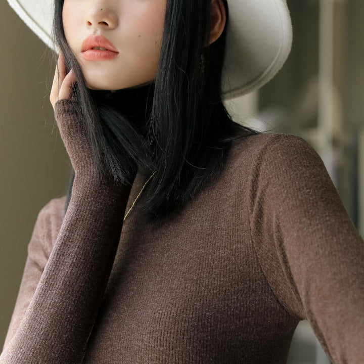 Damer Langærmet ribstrik bluse med elegant ståkrave og tætsiddende pasform Stilla