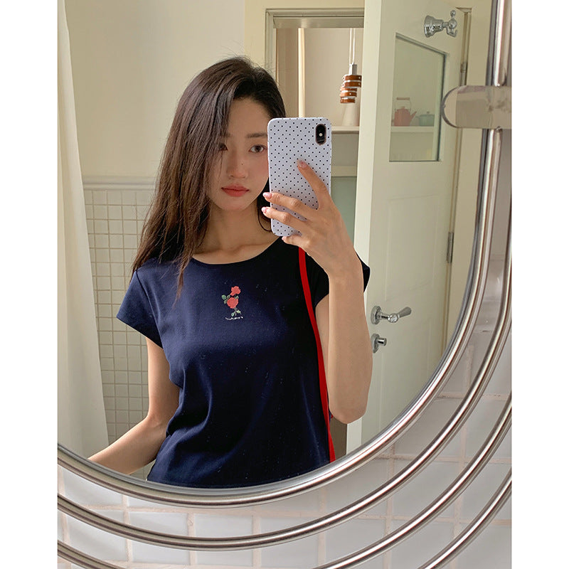 Damer casual top med blomstret design og svajende volangskørt Stilla