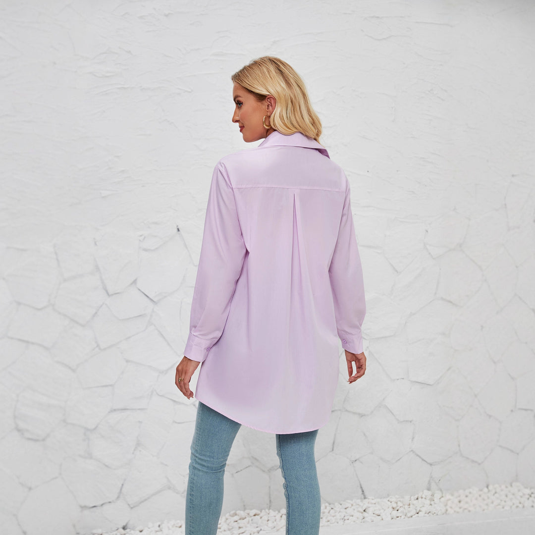 Dame skjorte bluse med elegant oversized snit og klassiske detaljer med knapper Skovae