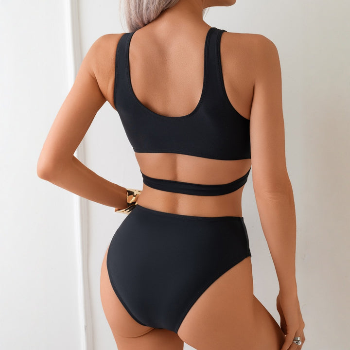 Dame heldragt badedragt med innovativt cut-out-design og sporty knude Stilla
