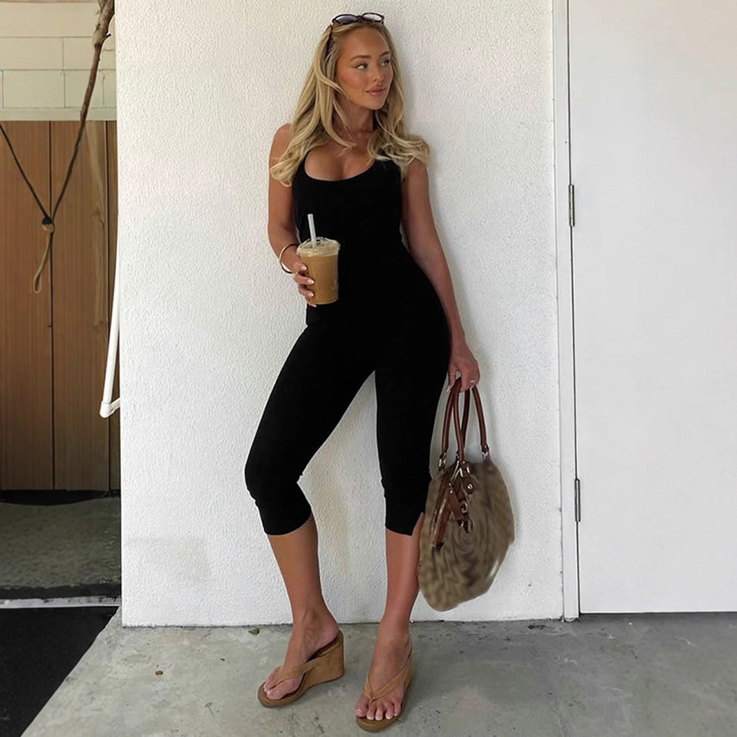 Dame kortærmet jumpsuit med moderne polokrave og tætsiddende snit Skovae