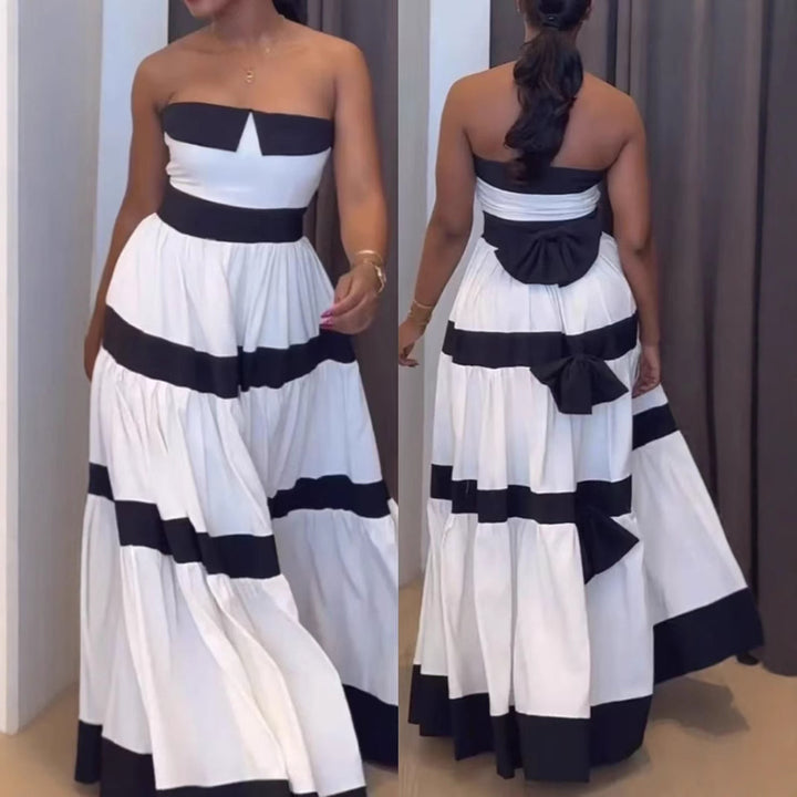 Dame maxikjole med fashionable stribet mønster og elegant rygdetalje Stilla