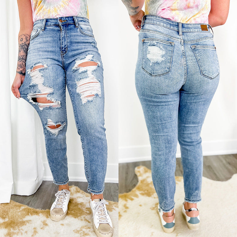 Damer ødelagte denim-bukser i skinny-fit-design med markante revner Stilla