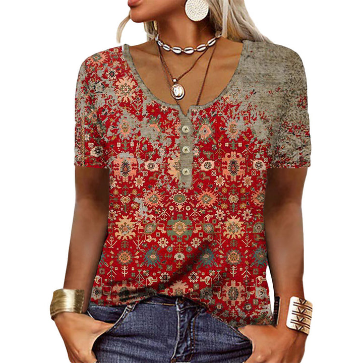 Damebluse med blomsterdesign og knaplukning Stiila
